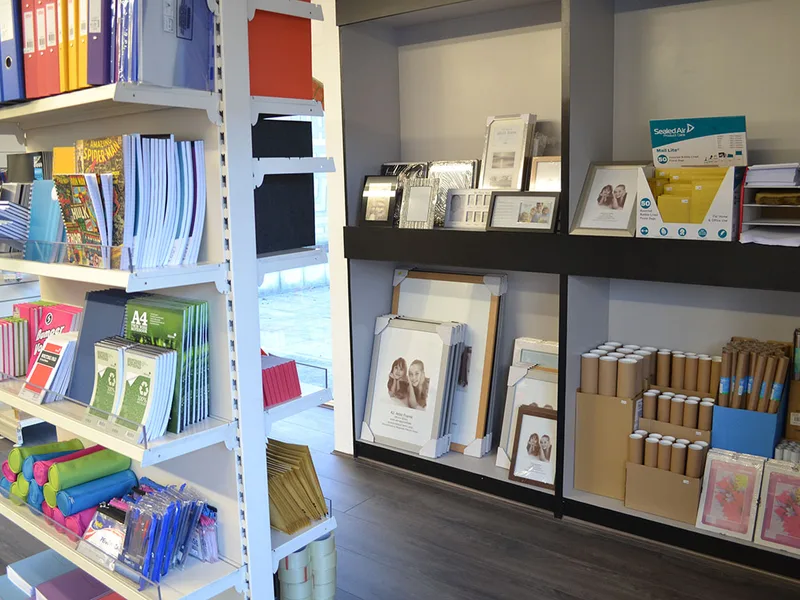 Paper stocks, card samples and finished prints inside the Waltham Print studio